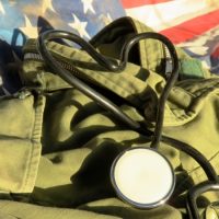 Stethoscope with army fatigues and an American flag