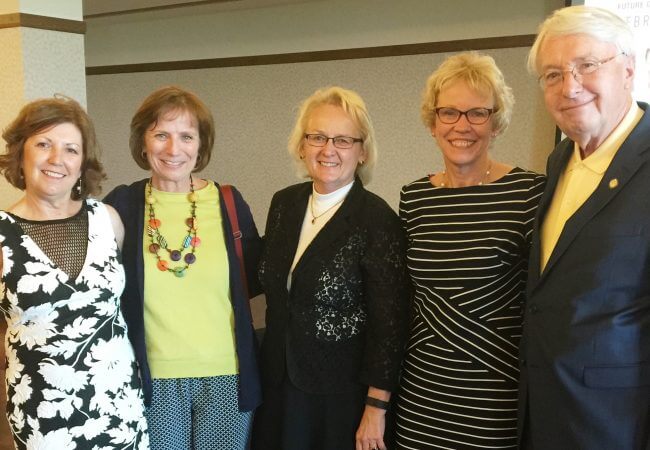 Victoria Vinton (far left) celebrates the Nebraska Action Coalition’s fifth birthday during the RWJF Culture of Health Summit in Omaha in June 2016. Also pictured: Campaign Director Sue Hassmiller, Nebraska Action Coalition board members Cyndi McCullough and Deb Welk, and Nebraska Sen. Merv Riepe.