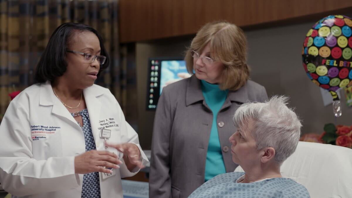Nurse explains to caregiver and patient what it needed to be done in order to get the patient healthy.  